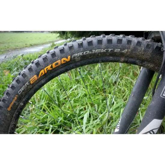 Покришка безкамерна Continental Der Baron Projekt, 27.5 "x2.40, 60-584, чорна, складна, BlackChili, ProTection Apex, Skin, 950гр. 101572